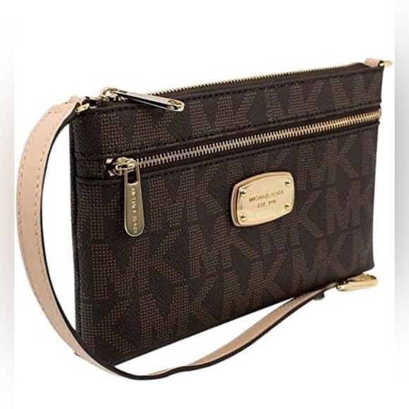 Michael Kors Handbags - Michael Kors Jet Set Large Wristlet Brown